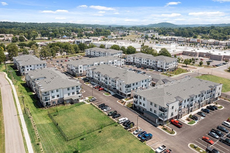 an aerial view of apartment buildings in a city
