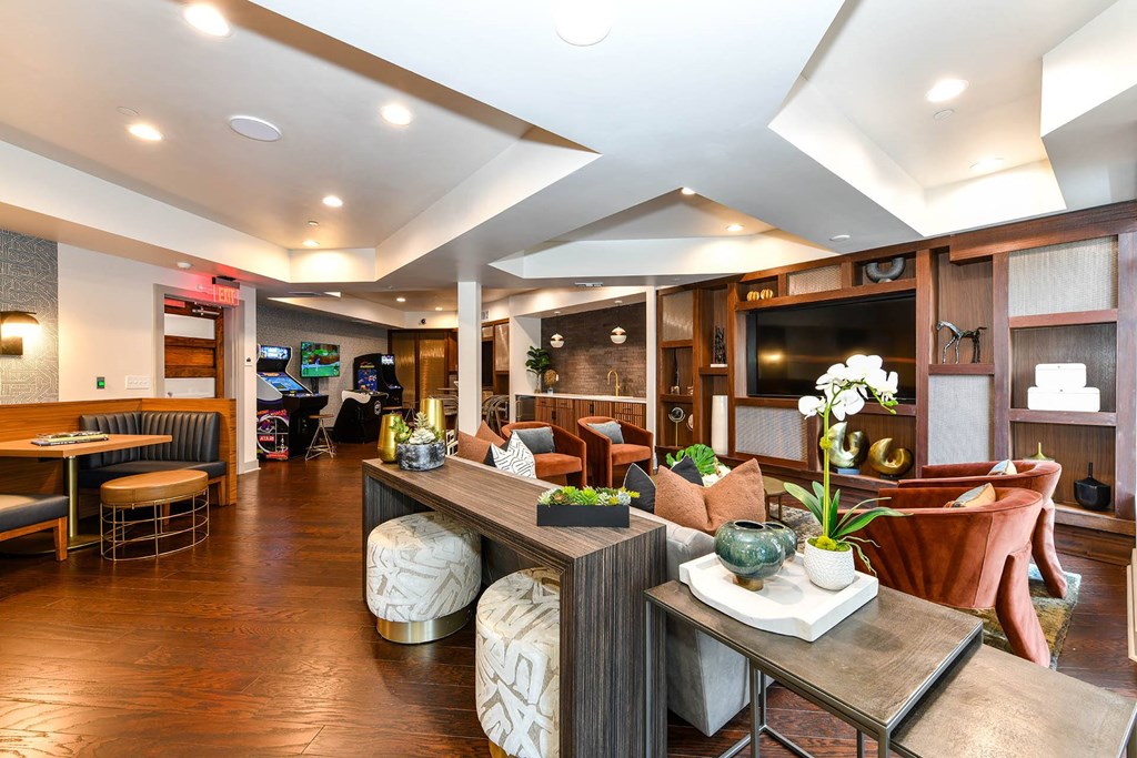 1-Bedroom Luxury Apartments In Buckhead, GA - 92 West Paces - Club Room With TV Lounge, Arcade Games, And Booth Seating.
