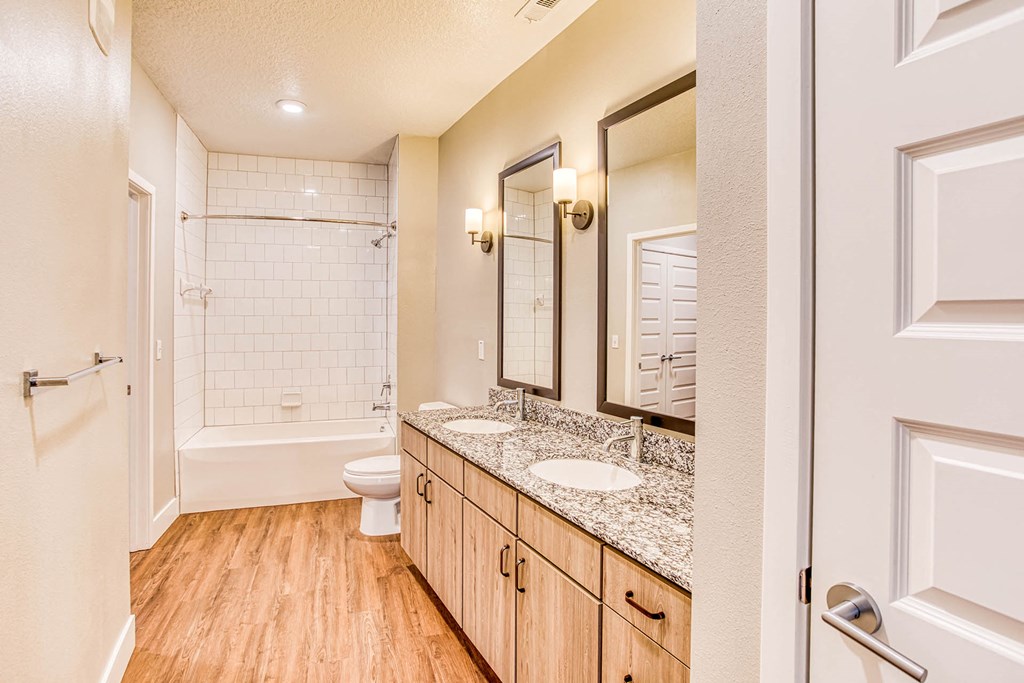Bathroom with Designer Granite Countertops at The Parker at Maitland Station in Maitland, FL