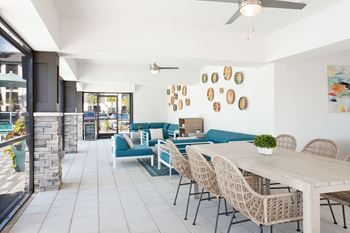 A patio with a table and chairs is shown.