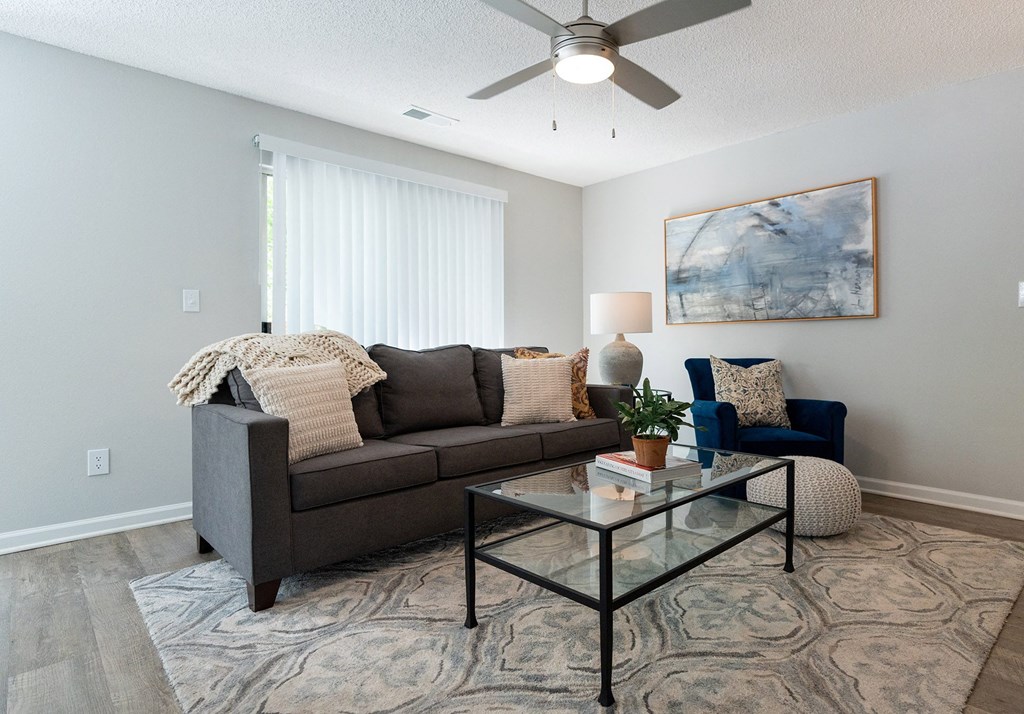 a living room with a couch and a coffee table