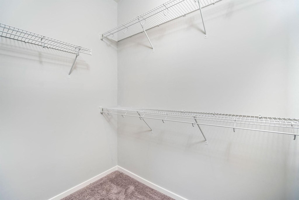 Empty shelves in a white room.