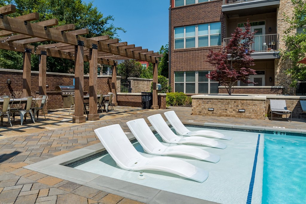 our apartments have a resort style pool with lounge chairs