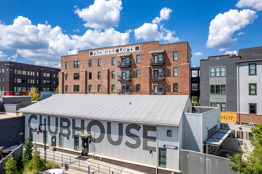 A building with a white roof and the word "CHURCH" written on it.