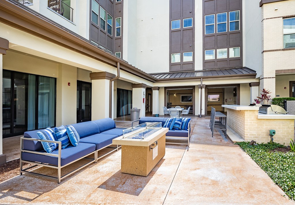 the preserve at ballantyne commons commons lobby with couches and a fire pit