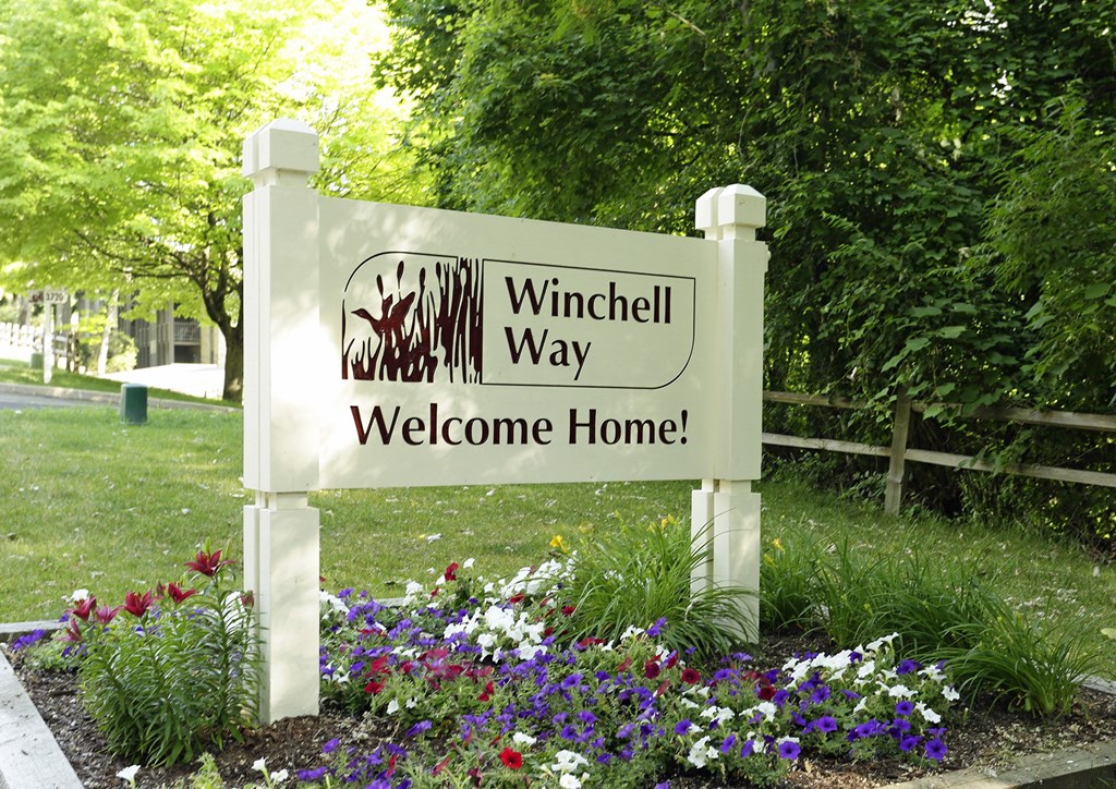 a sign that reads winchell way welcome home at Winchell Way Apartment , Kalamazoo