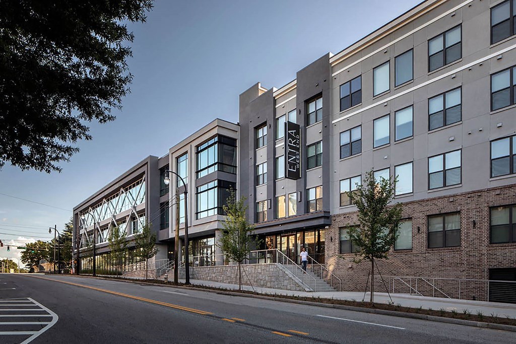 a rendering of a building on a city street