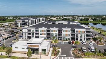 Beautifully landscaped grounds at The Citizen at Waterset apartments in Apollo Beach, FL.