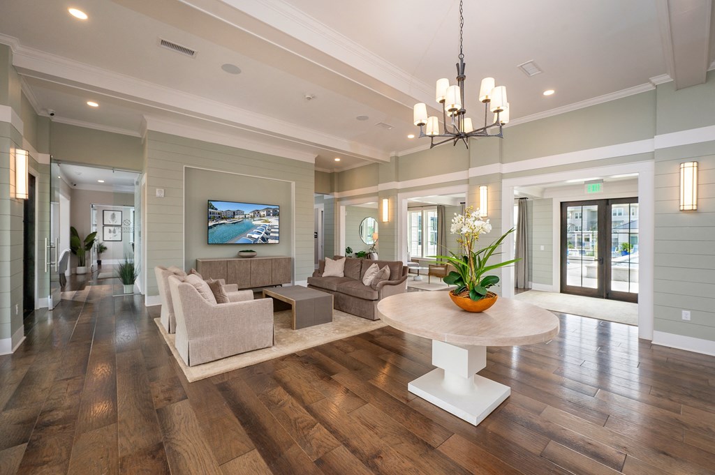 a living room with couches and a table
