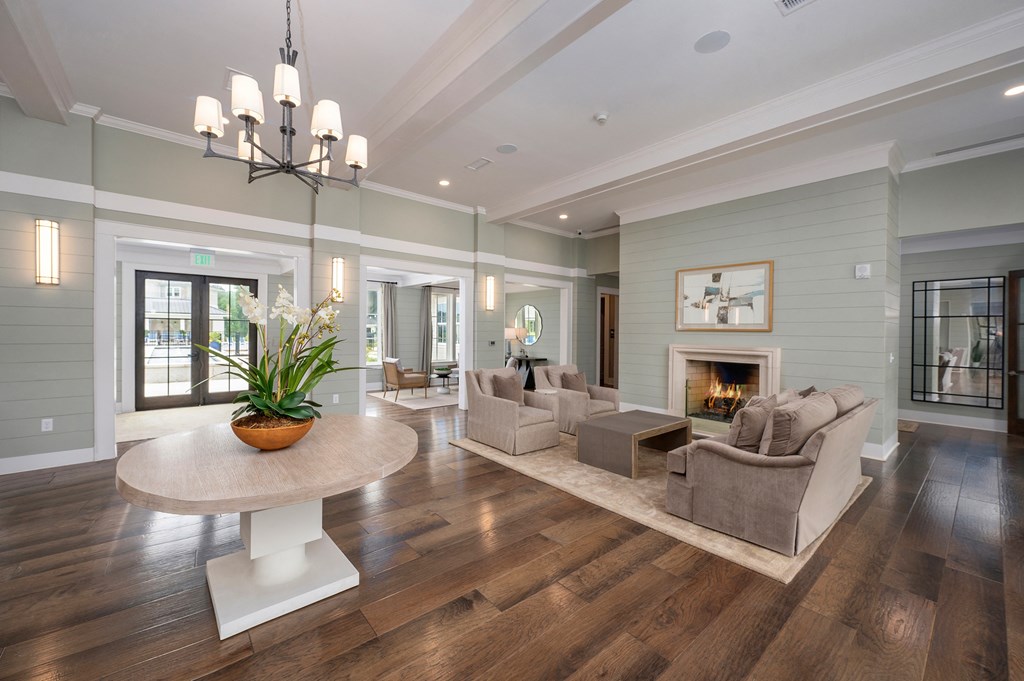a living room with couches and a table