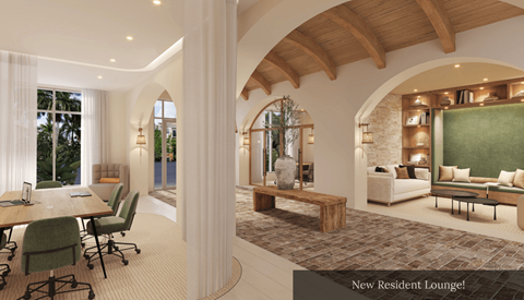 A modern residential lounge with a green sofa and a stone fireplace.