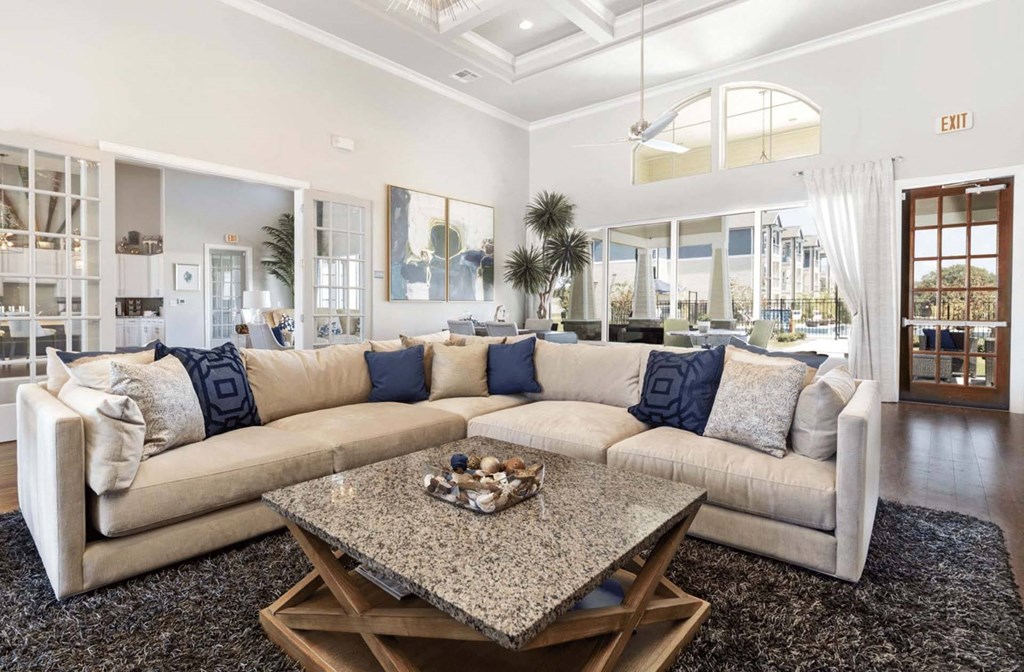 a living room with a couch and a table