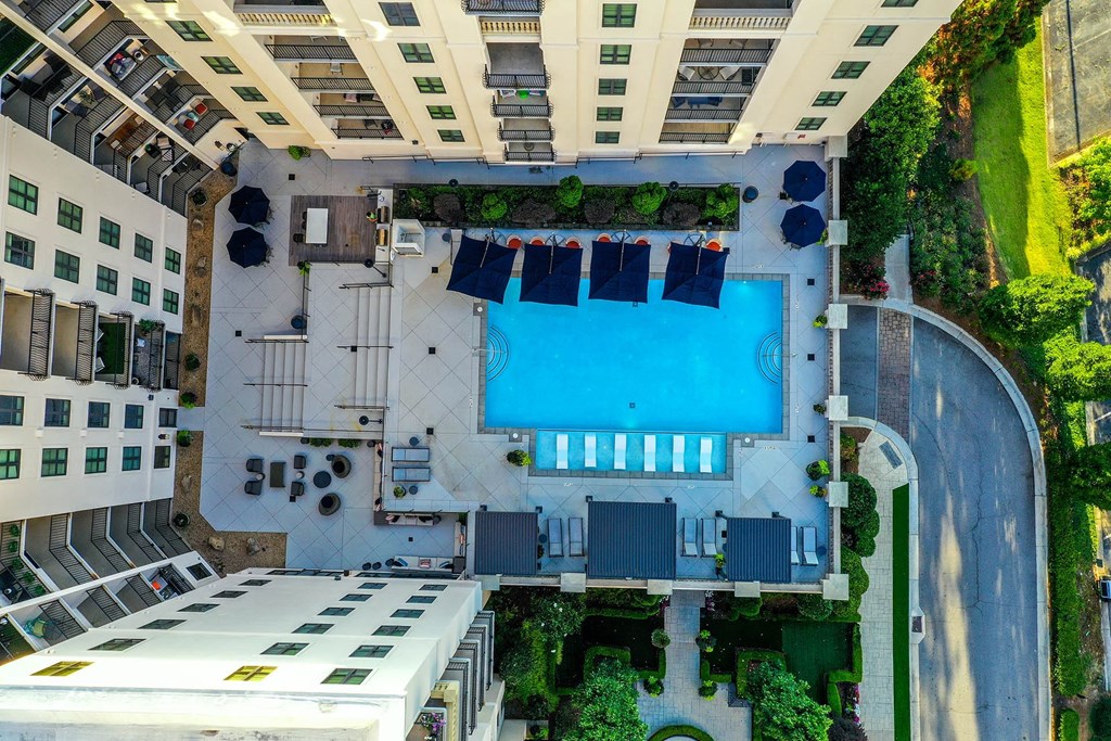arial view of a swimming pool in the middle of a building