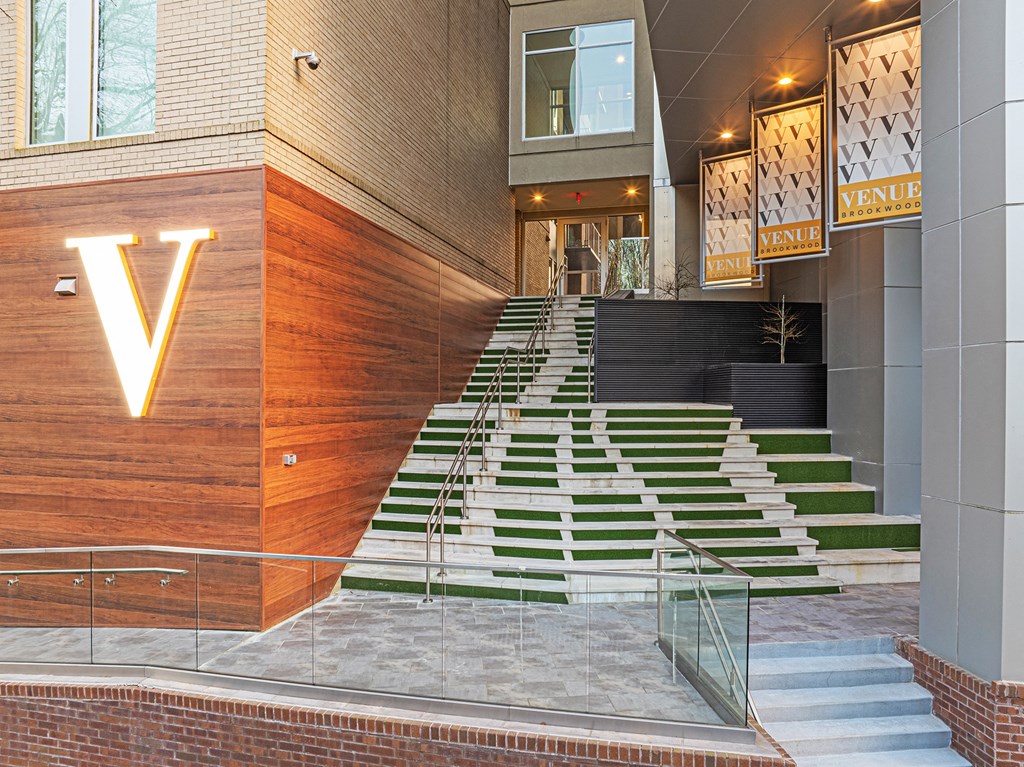 the entrance of a building with stairs