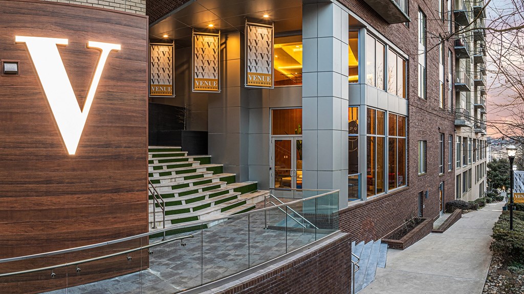 a view of the front of a building with a staircase