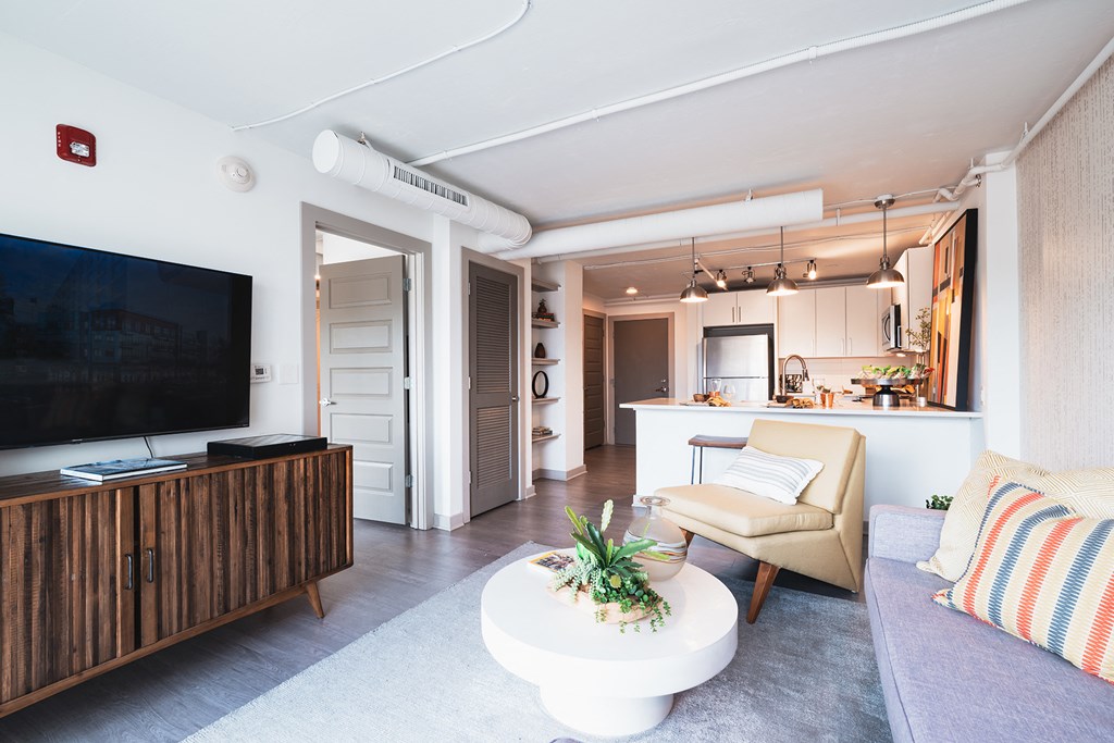a living room with a couch and a television
