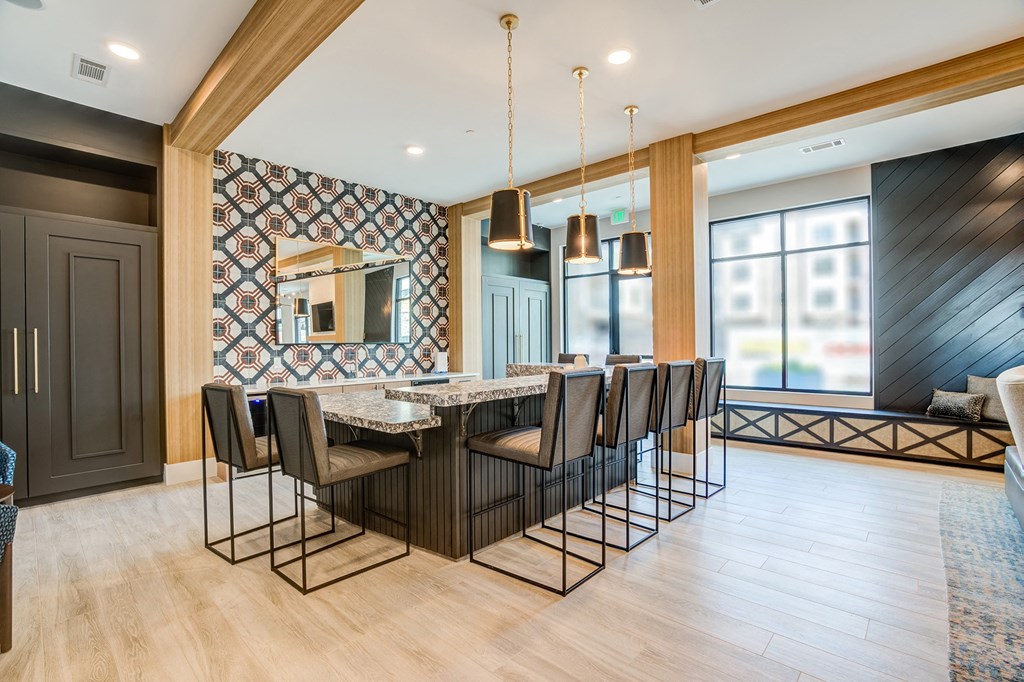 a kitchen and dining area with a large table and chairs