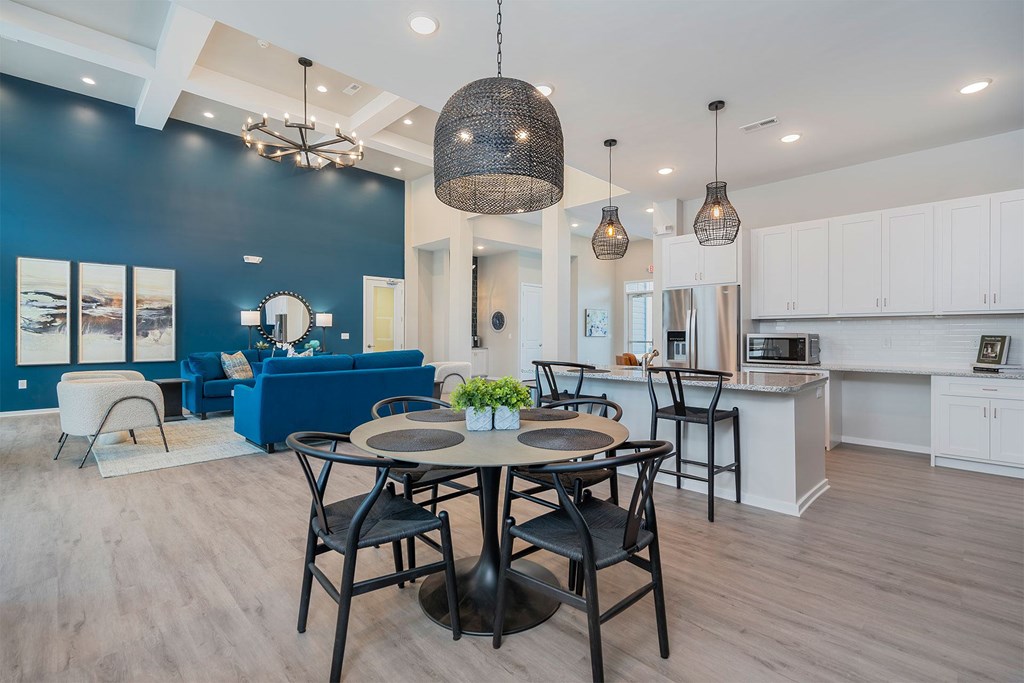 A modern dining area with a table set for four.
