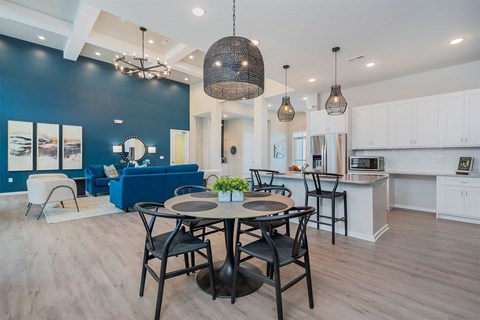 A modern dining area with a table set for four.