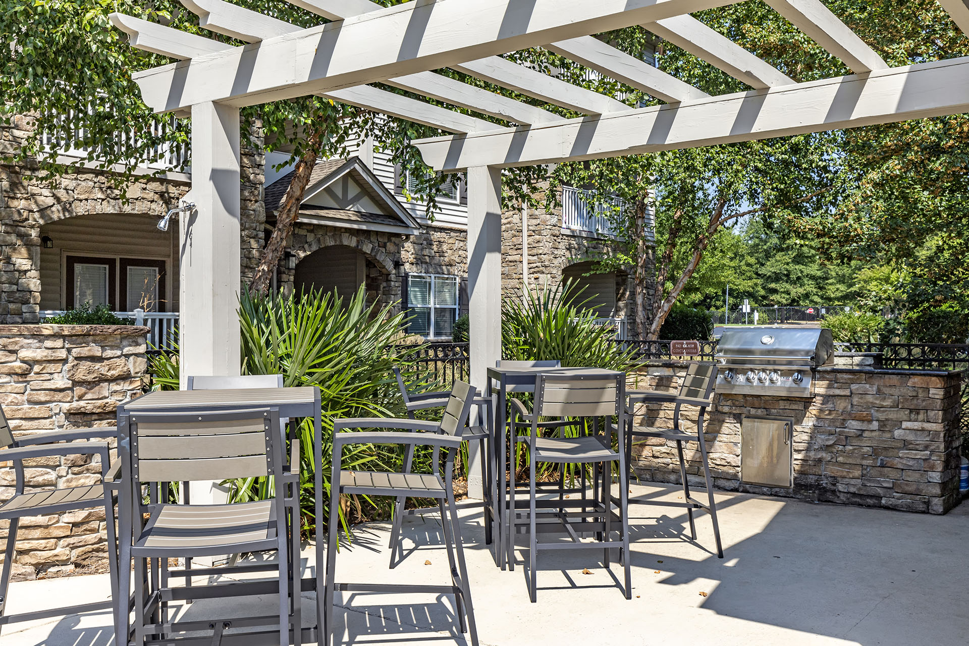 Enclave at Rivergate grill area.