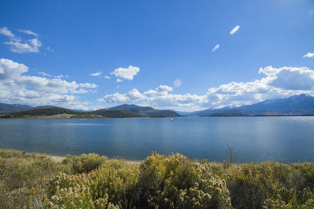 a view of a lake with mountains in the background