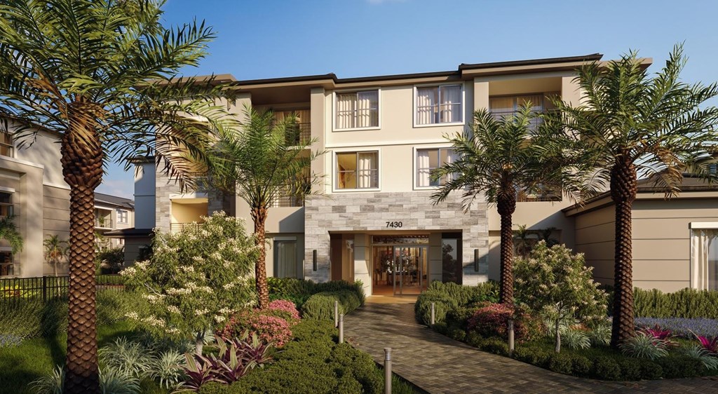 A modern building with a garden in front.