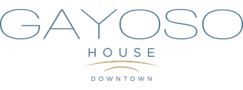 the logo or sign for the guest house