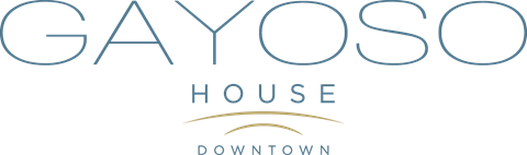 the logo or sign for the guest house