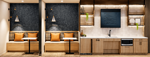 A modern kitchen with a wooden counter and a blackboard on the wall.