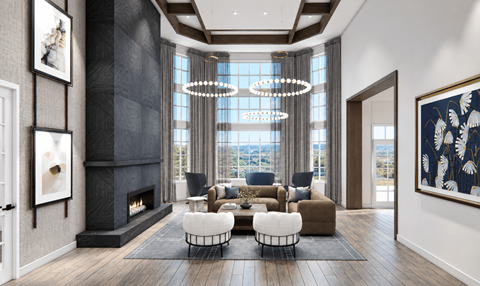 A modern living room with a fireplace and a view of the city.
