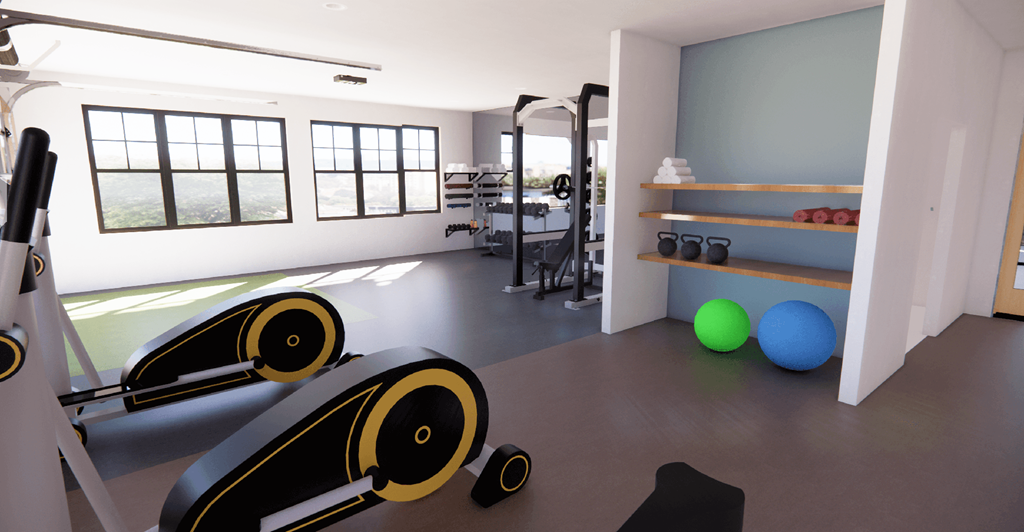 a gym with weights and other exercise equipment on the floor