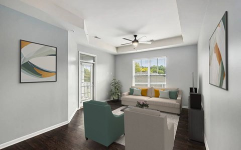 A living room with a green chair and a white couch.