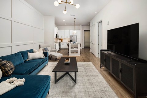 a living room with a couch and a tv