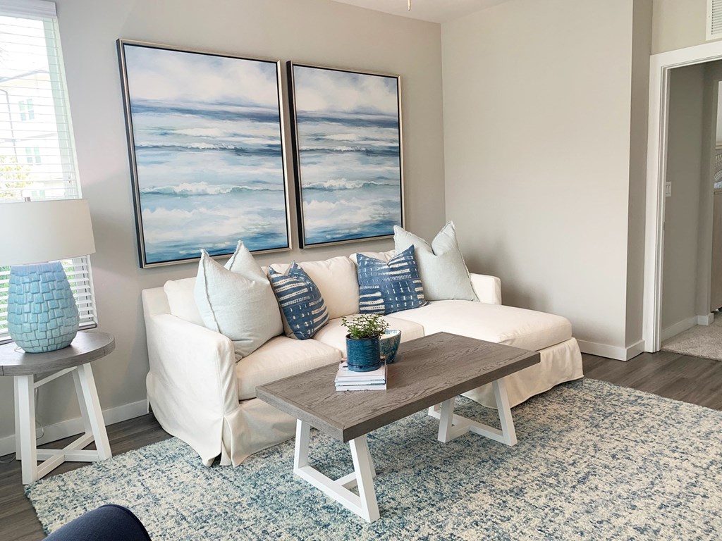 a living room with a couch and a coffee table