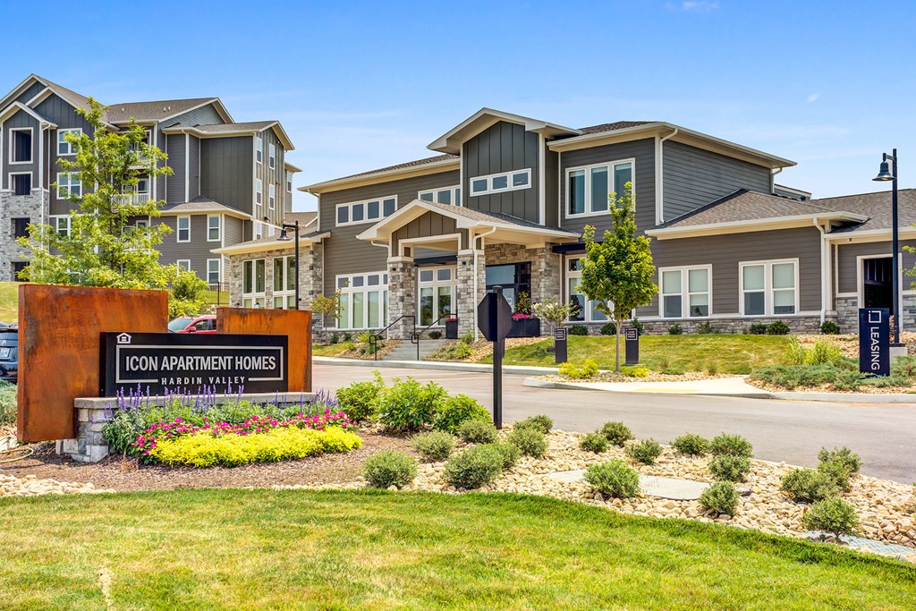 a building with a street sign in front of it