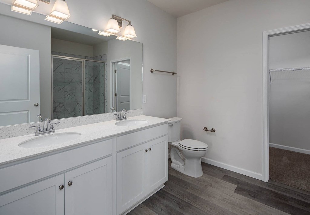 a bathroom with a toilet and a sink