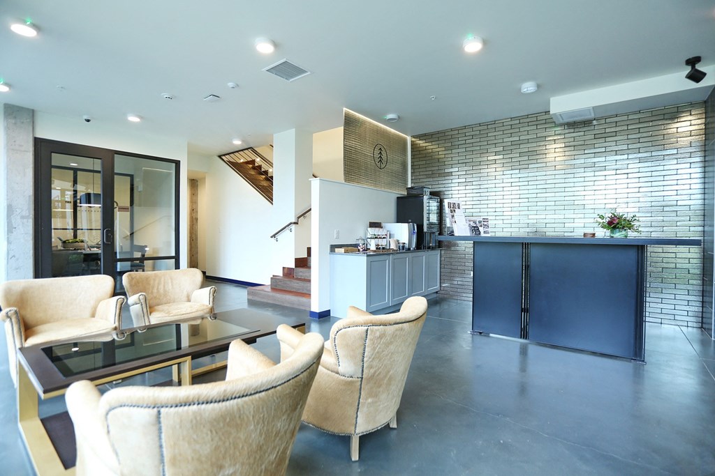 a view of the living room and kitchen from the dining area