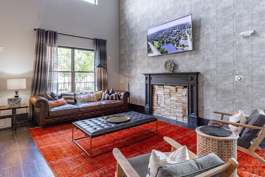 a living room with a couch and a fireplace