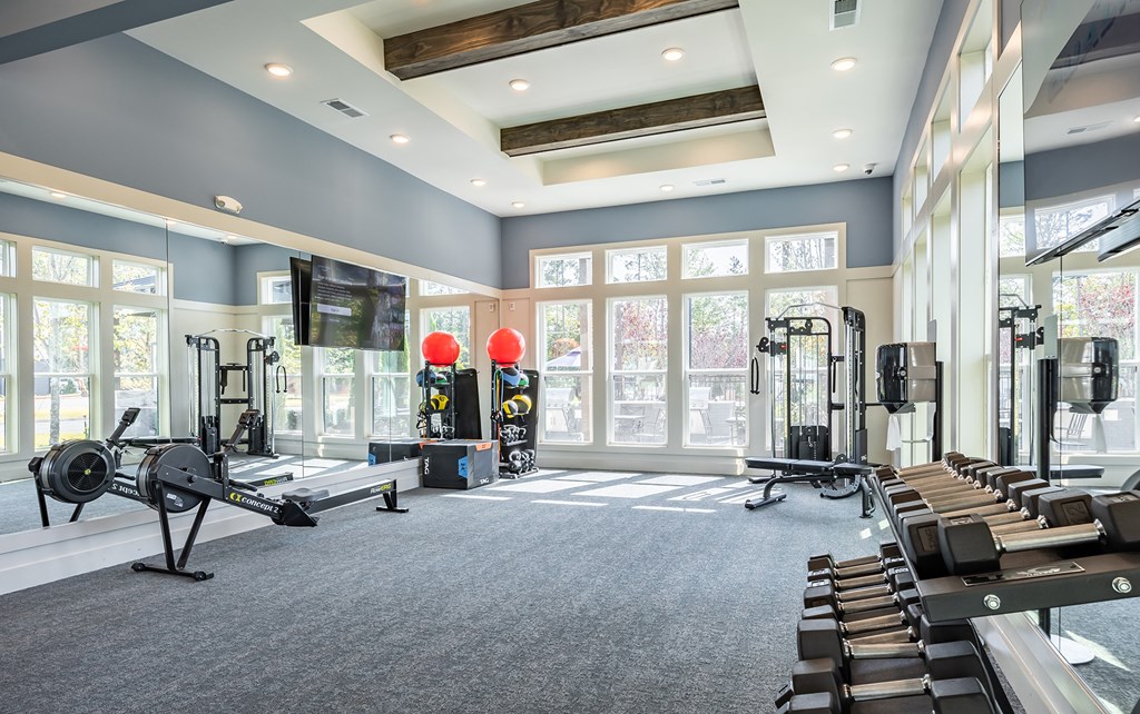 Three-BR Apartments In Antioch, TN - Novo Hickory Highlands - State-of-the-Art Fitness Center Equipped With Weights, Strength Training Machines, Full Body Cardio Machine, Yoga Balls, Workout Bench, Windows For Natural Sunlight, TVs, And Full Body Mirrors.