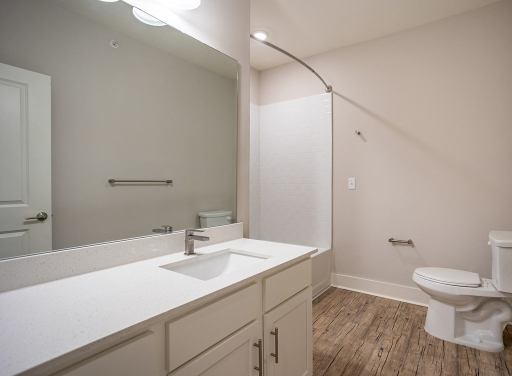 an empty bathroom with a sink and a toilet