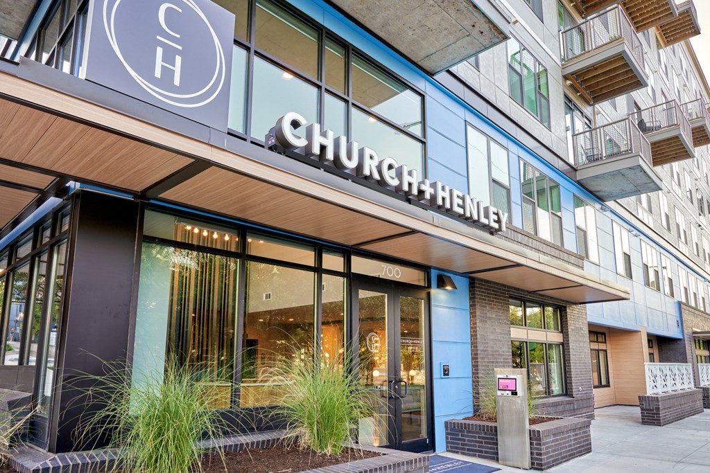a church building with a sign on the front of it