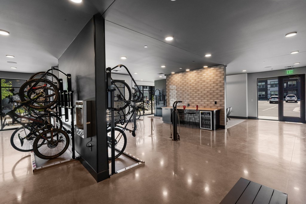 A bike shop with a variety of bikes on display.