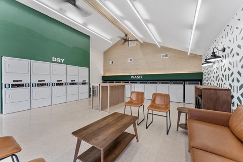 A laundry room with a dry section and a wash section.