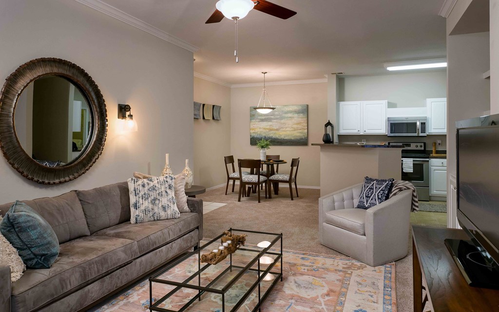 a living room with a couch and a table