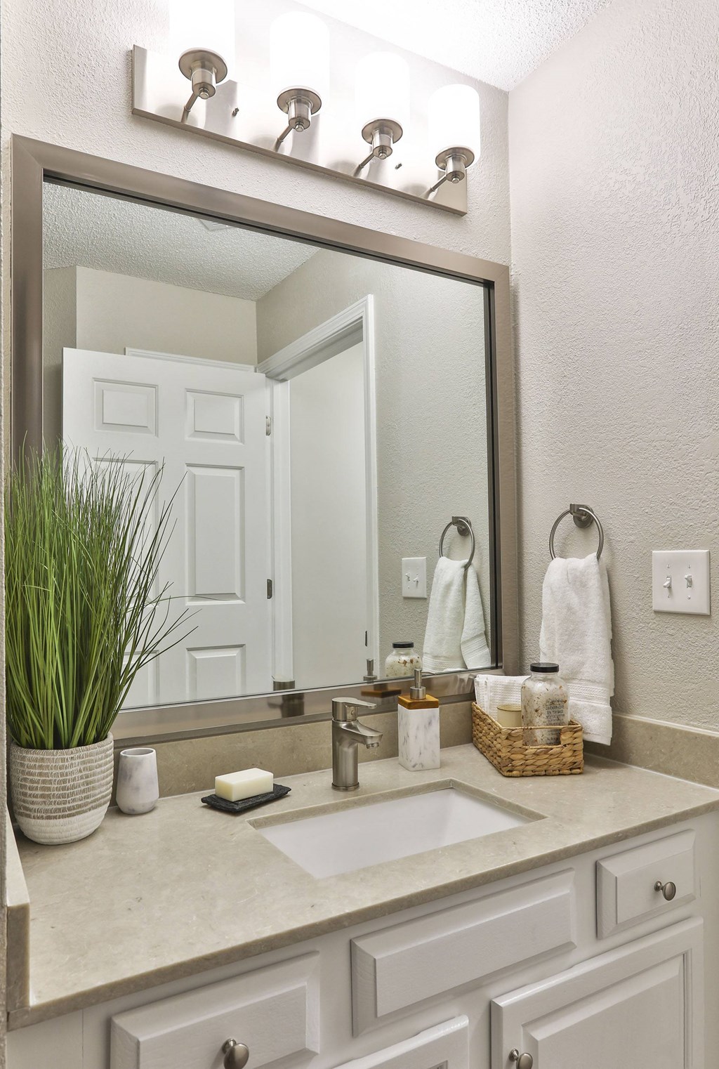 a bathroom with a sink and a mirror at Crestmont at Thornblade, Greenville, SC