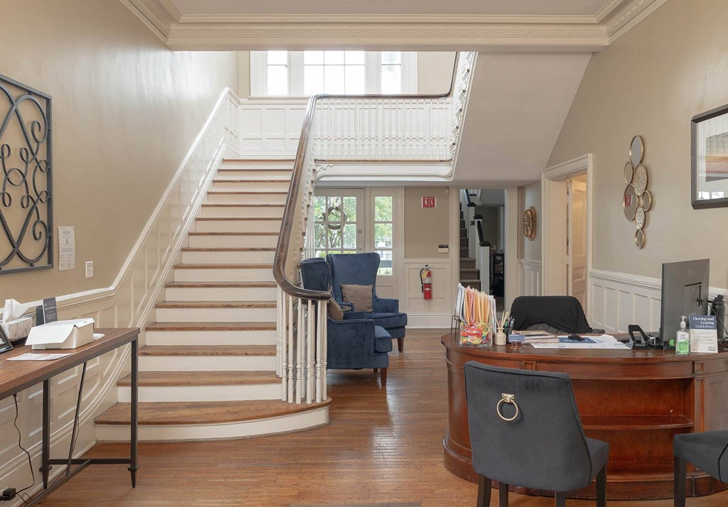 a view of the living room and stairs leading up to the second floor