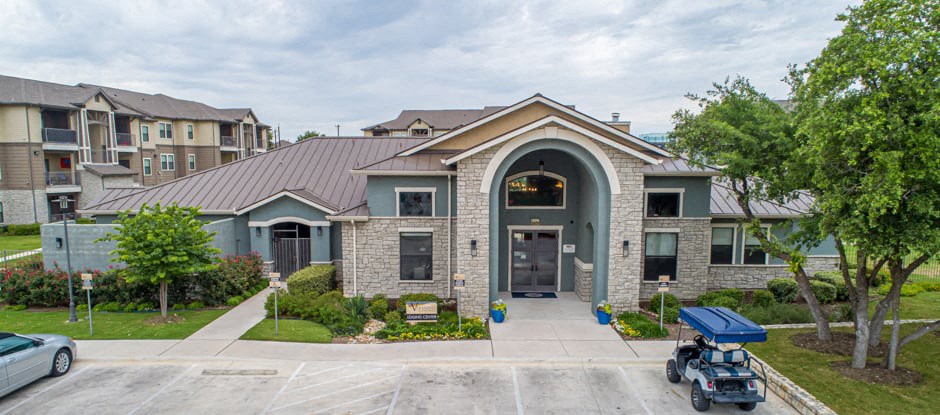 a house with a motor scooter parked in front of it