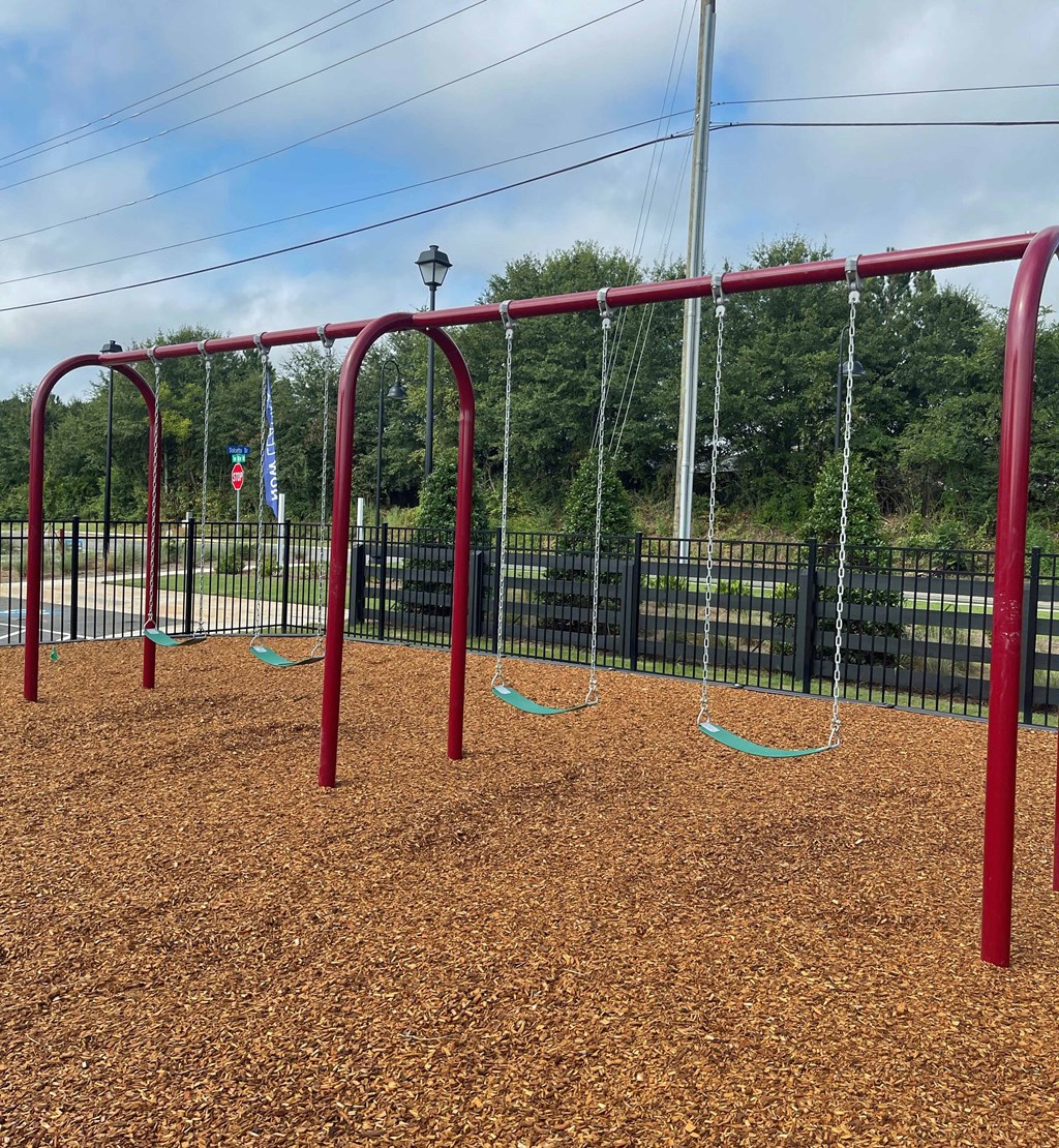 a swing set at a park