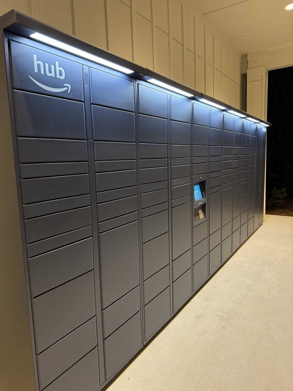 a large group of lockers with a hole in the side
