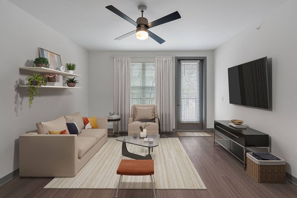 a living room with a couch and a tv